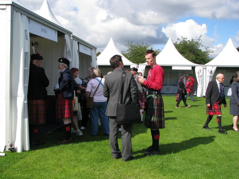 IN FRONT OF THE TENT